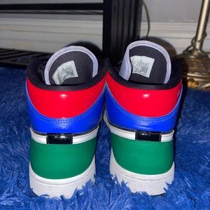 Women’s multi colored patent Jordan 1 tennis shoe